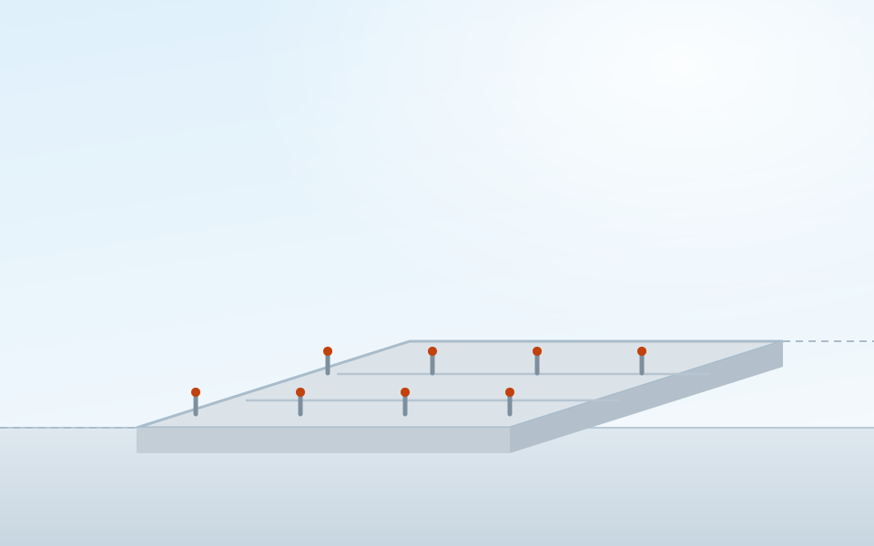 Illustration of a finished concrete slab with a thickened edge and anchor bolts set in two rows ready for a steel building